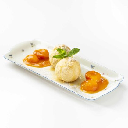 Apricot dumplings with butter crumbs